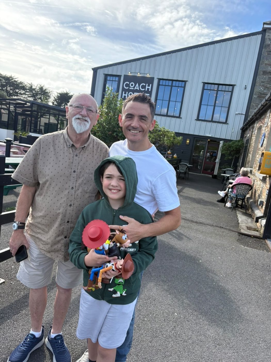 Kevin with family outside a café in Ireland